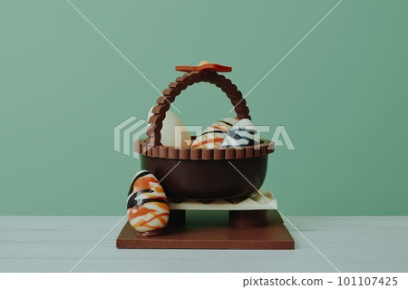 basket with eggs as spanish mona de pascua 101107425