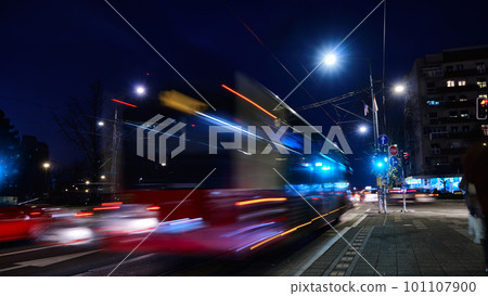 Bus rides on night city street Bus rides on night city street 101107900