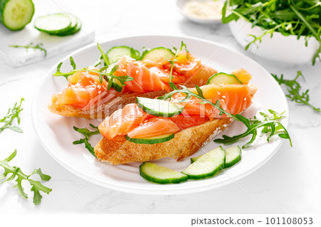 Sandwiches with salted salmon. Healthy food, breakfast Sandwiches with salted salmon. Healthy food, breakfast 101108053