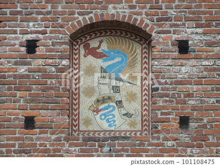 Coat of arms of the Visconti family on the walls of the citadel Castello Sforzesco (Sforza Castle) in Milan, Italy 101108475