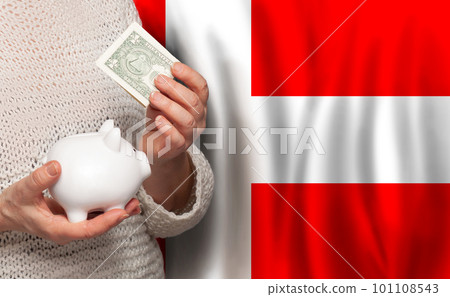 Danish woman with money bank on the background of Denmark flag. Dotations, pension fund, poverty,  101108543