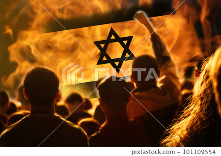 Protests Israel Tel Aviv. Israel flag. Protest in Israel 2023. Rise hand. Defense minister. Fire, flame, revolution. Out of focus 101109554
