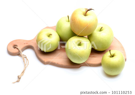 Apples on board isolated on white background. Apples on board isolated on white background. 101110253