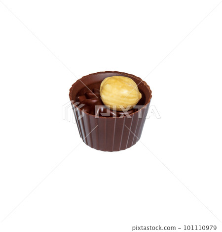 Chocolate candy with cream and nuts on white isolated background. Idea for dessert in restauran Chocolate candy with cream and nuts on white isolated background. Idea for dessert in restauran 101110979