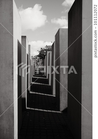 Greyscale shot of the Memorial to the Murdered Jews of Europe in Berlin, Germany Greyscale shot of the Memorial to the Murdered Jews of Europe in Berlin, Germany 101112072