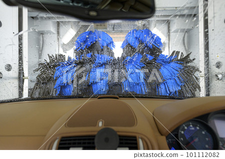 Washing a car with a car wash machine (taken from inside the car) 101112082