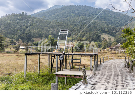 Structure at Pai Buddha bamboo bridge or Boon Ko Ku So walkway across rice fields. Thai words translated as Garden Heaven Stairs in English Language. Structure at Pai Buddha bamboo bridge or Boon Ko Ku So walkway across rice fields. Thai words translated as Garden Heaven Stairs in English Language. 101112356