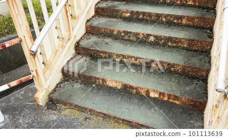 Degraded footbridge stairs Degraded footbridge stairs 101113639