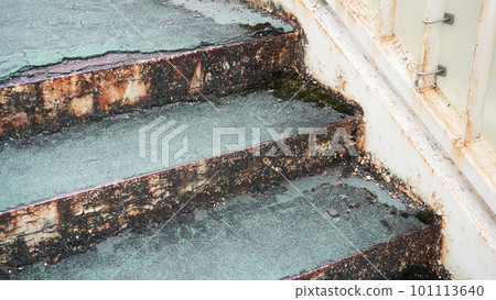 Degraded footbridge stairs Degraded footbridge stairs 101113640