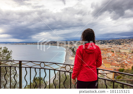 Woman tourist at a viewpoint in Historic City of Nice, France. Castle Hill 101115321