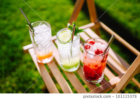 Summer cocktails. Alcoholic cocktail with ice and citrus fruits. 101115378