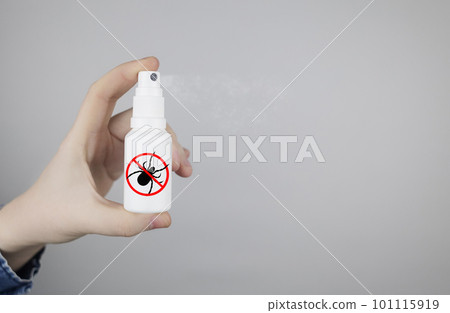 Tick repellant. Insect protection. Girl holds a spray on a white background that will protect against ticks. Repelling blood-sucking insects. Tick repellant. Insect protection. Girl holds a spray on a white background that will protect against ticks. Repelling blood-sucking insects. 101115919