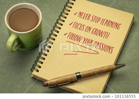 never stop learning, focus on growth, follow your passions - inspirational notes and reminders in a spiral sketchbook, desktop flat lay, personal development concept never stop learning, focus on growth, follow your passions - inspirational notes and reminders in a spiral sketchbook, desktop flat lay, personal development concept 101116555