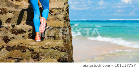 Young girl with slim body running up by stairs Young girl with slim body running up by stairs 101117757