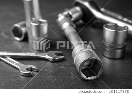 Auto mechanic's tools on grey background, closeup Auto mechanic's tools on grey background, closeup 101117878