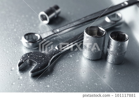 Auto mechanic's tools on metallic surface, closeup Auto mechanic's tools on metallic surface, closeup 101117881