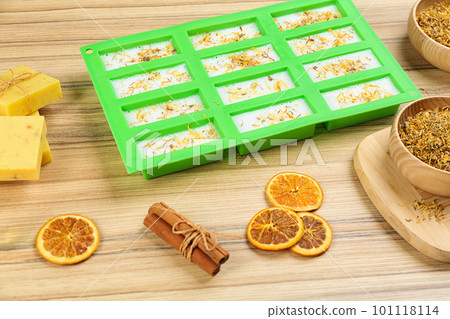 Natural handmade soap and ingredients on wooden table 101118114