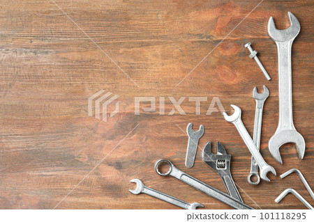 Auto mechanic's tools on wooden background, flat lay. Space for text 101118295