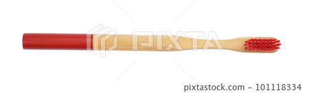 Bamboo toothbrush with red bristle isolated on white, top view Bamboo toothbrush with red bristle isolated on white, top view 101118334
