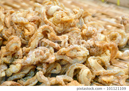 Pork rinds or deep fried pork skin, a yummy snack. Pork rinds or deep fried pork skin, a yummy snack. 101121109