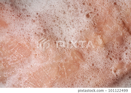 Photo of the texture of cosmetic foam or soap on the hand. Photo of the texture of cosmetic foam or soap on the hand. 101122499