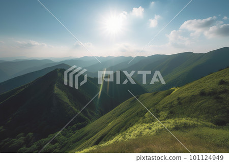 Beautiful sunrise over the green mountains in morning light with fluffy clouds on a bright blue sky. Nature freshness concept 101124949