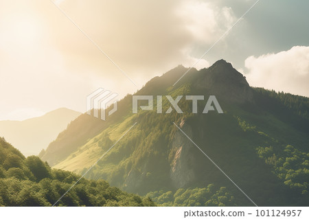 Beautiful sunrise over the green mountains in morning light with fluffy clouds on a bright blue sky. Nature freshness concept 101124957