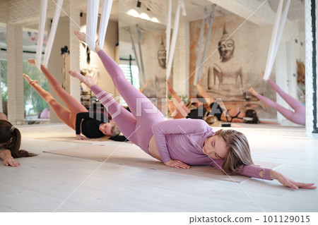 workshop of air yoga and stretching in yoga studio 101129015