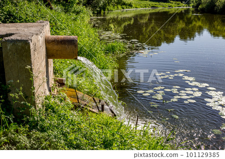 Drain water from the pipe into the river Drain water from the pipe into the river 101129385