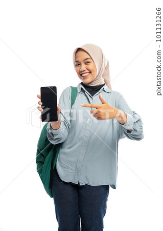 Asian female student pointing at blank phone screen on white Asian female student pointing at blank phone screen on white 101131266