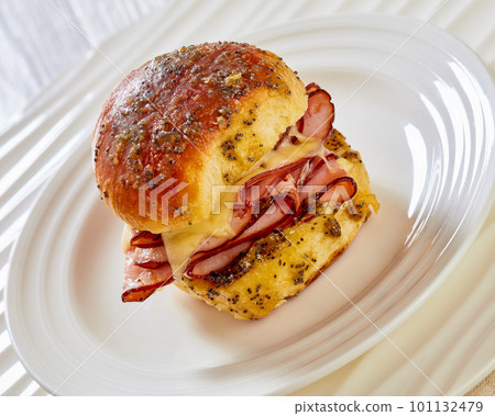 Hawaiian Ham and Swiss Slider on white plate Hawaiian Ham and Swiss Slider on white plate 101132479