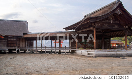 A Noh stage with a large torii gate over the bridge, Itsukushima Shrine, a World Heritage site A Noh stage with a large torii gate over the bridge, Itsukushima Shrine, a World Heritage site 101132615