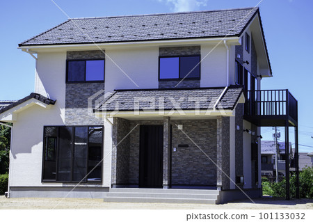 Exterior of new house with veranda Exterior of new house with veranda 101133032
