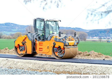 roller for asphalt compaction during the construction of a new road and traffic communication roller for asphalt compaction during the construction of a new road and traffic communication 101138678