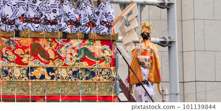 Gion Festival, the moment when a child is carried on a naginata-boko before departure Gion Festival, the moment when a child is carried on a naginata-boko before departure 101139844