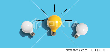 One out unique idea light bulb concept - Flat lay One out unique idea light bulb concept - Flat lay 101141910