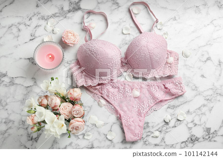 Flat lay composition with women's underwear on marble background 101142144