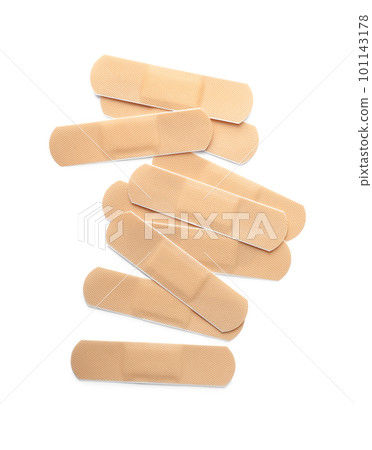 Medical sticking plasters isolated on white. First aid item Medical sticking plasters isolated on white. First aid item 101143178