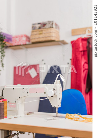 Sewing textile industry workplace atelier for hand made craft. Sewing machine with no people 101143923