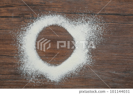Frame made with flour on wooden table, top view. Space for text Frame made with flour on wooden table, top view. Space for text 101144031