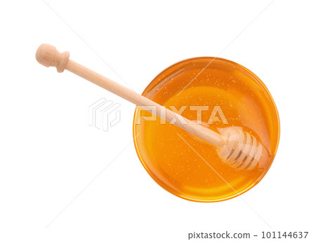 Bowl of organic honey and dipper isolated on white, top view 101144637