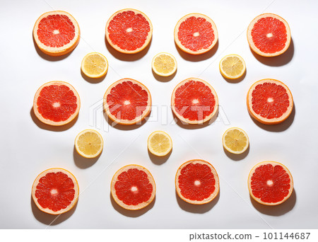 Flat lay composition with tasty ripe grapefruit slices on white background 101144687