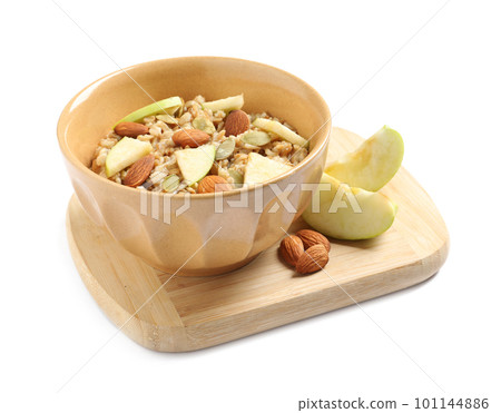 Tasty oatmeal with apples and almonds isolated on white. Healthy breakfast Tasty oatmeal with apples and almonds isolated on white. Healthy breakfast 101144886