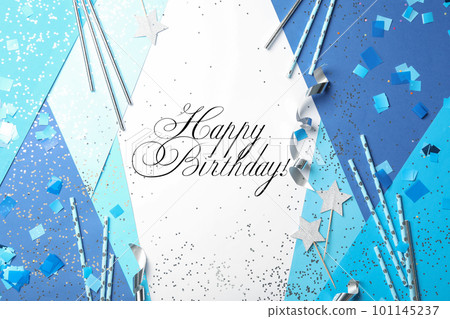 Flat lay composition with greeting HAPPY BIRTHDAY and party decor on color background 101145237