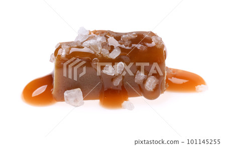 Delicious salted caramel with sauce on white background 101145255