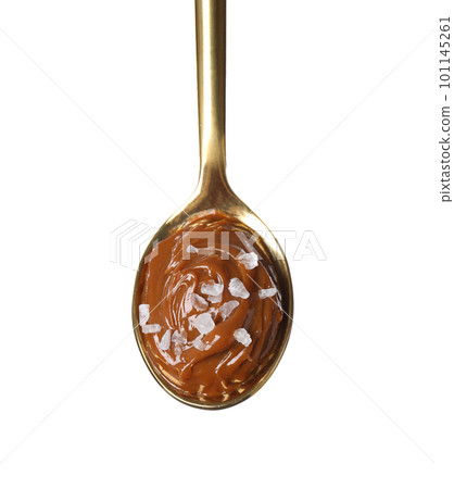 Salted caramel in spoon isolated on white 101145261