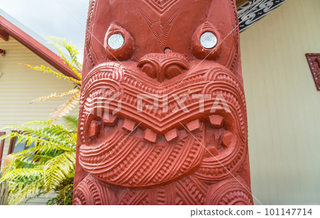 The Maori art carving decoration at Marae a sacred meeting ground in Whakarewarewa the living Maori village in geothermal area of Rotorua, New Zealand. 101147714