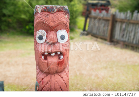 The Maori art carving decoration in Whakarewarewa the living Maori village in geothermal area of Rotorua, New Zealand. 101147737