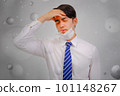 Asian man wear masks to protect PM 2.5 dust and air pollution and headache and sickness, air pollution concept, healthcare concept. 101148267
