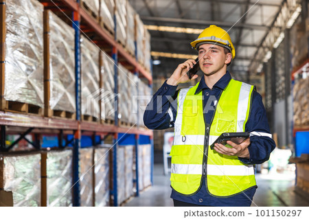 engineer worker using smartphone phone calling people in factory store warehouse engineer worker using smartphone phone calling people in factory store warehouse 101150297